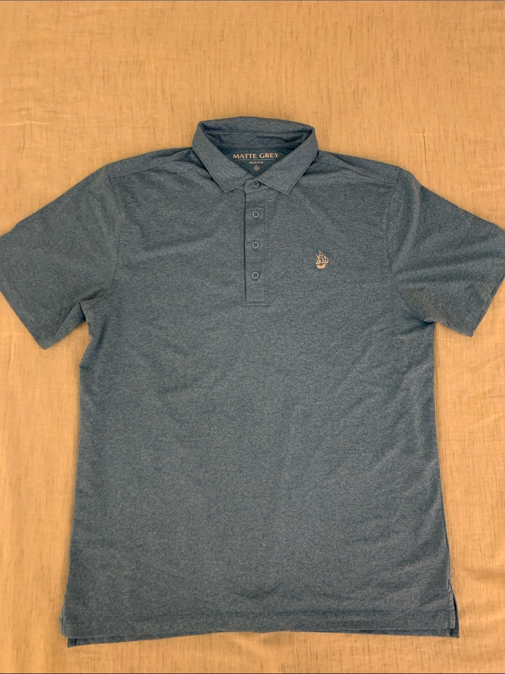 Men's Heather Blue Golf Polo with Pirate Ship Logo